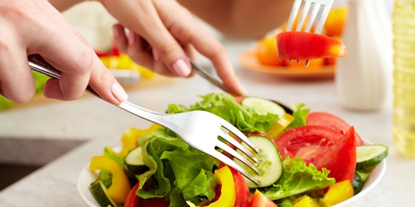 Close-up of human hands with forks tasting salad; Shutterstock ID 82023532; PO: aol; Job: production; Client: drone